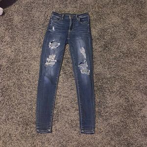 size 0, blue ripped skinny jeans